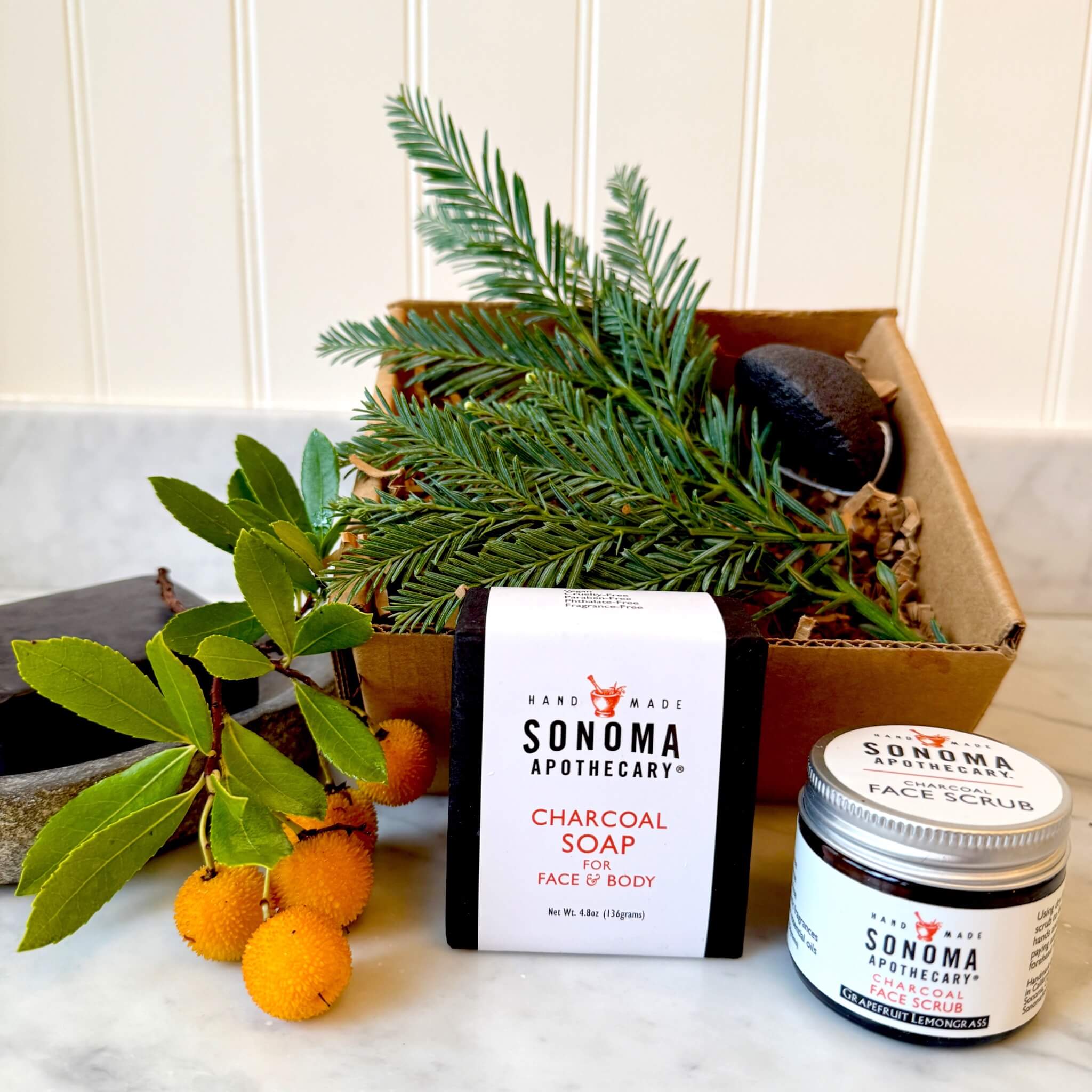 Good Face Behavior gift box set with charcoal soap, face scrub, and sponge — purifies and refreshes skin. 